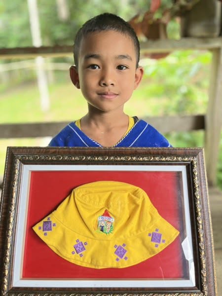 น้องคอปเตอร์กับหมวกพระราชทาน ที่เก็บรักษาไว้อย่างดี